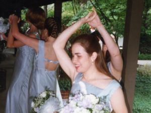 Bridesmaids dancing before the ceremony.
